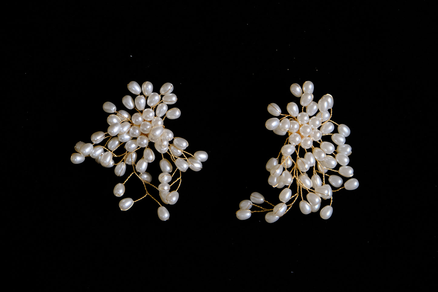 The DUOs Iconic Pearly Falls Cluster Earrings