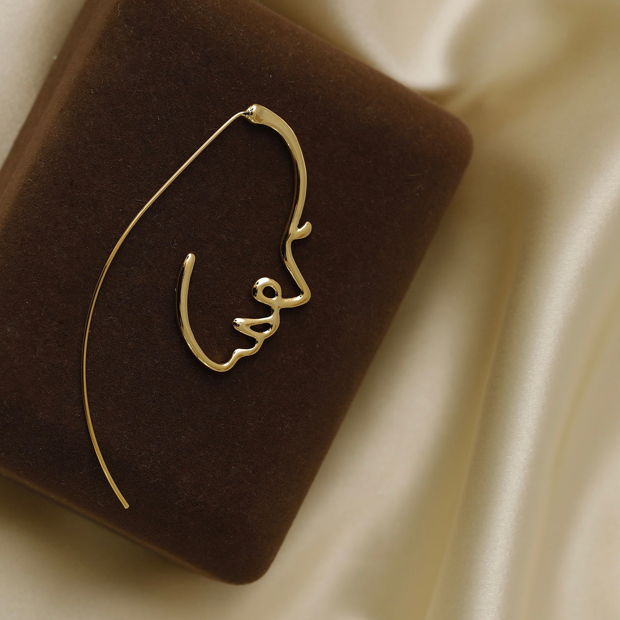 The DUOs 14K Human Face Abstract Earrings